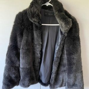 Zara Faux Fur coat. size: XS. Color: black.